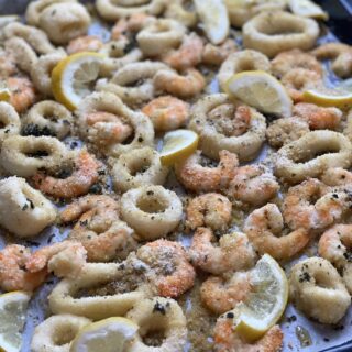 Gamberi e calamari gratinati